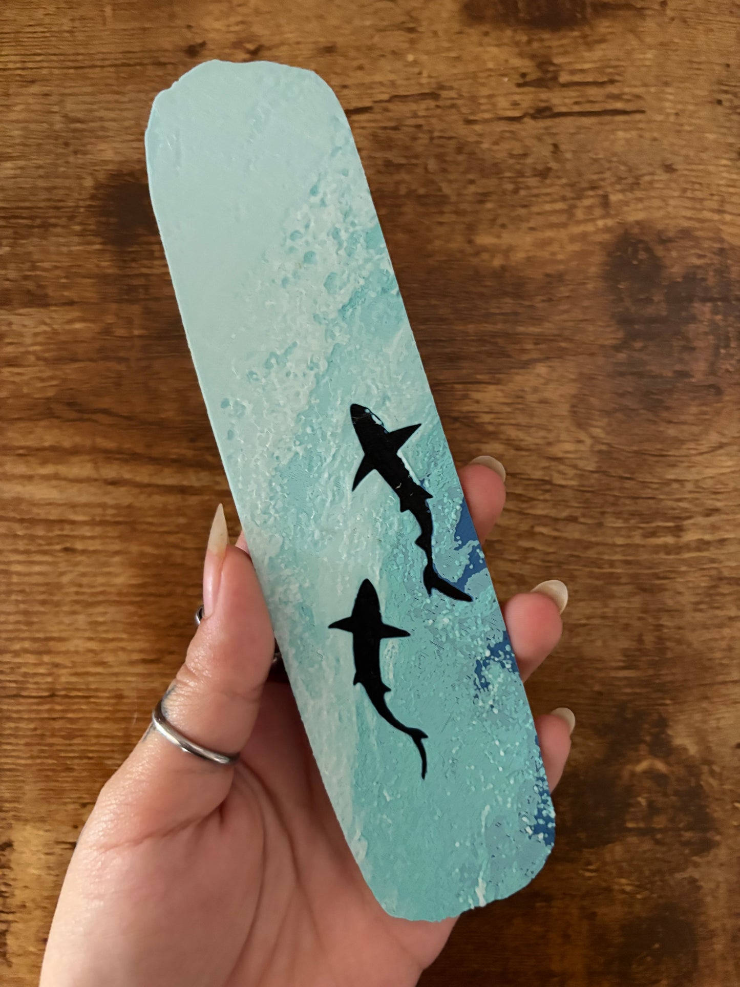 Swimming whales bookmark