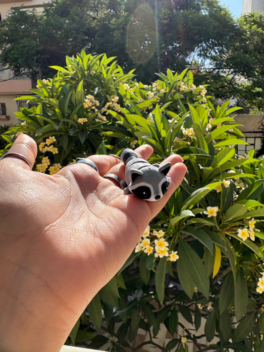 Articulated raccoon keychain