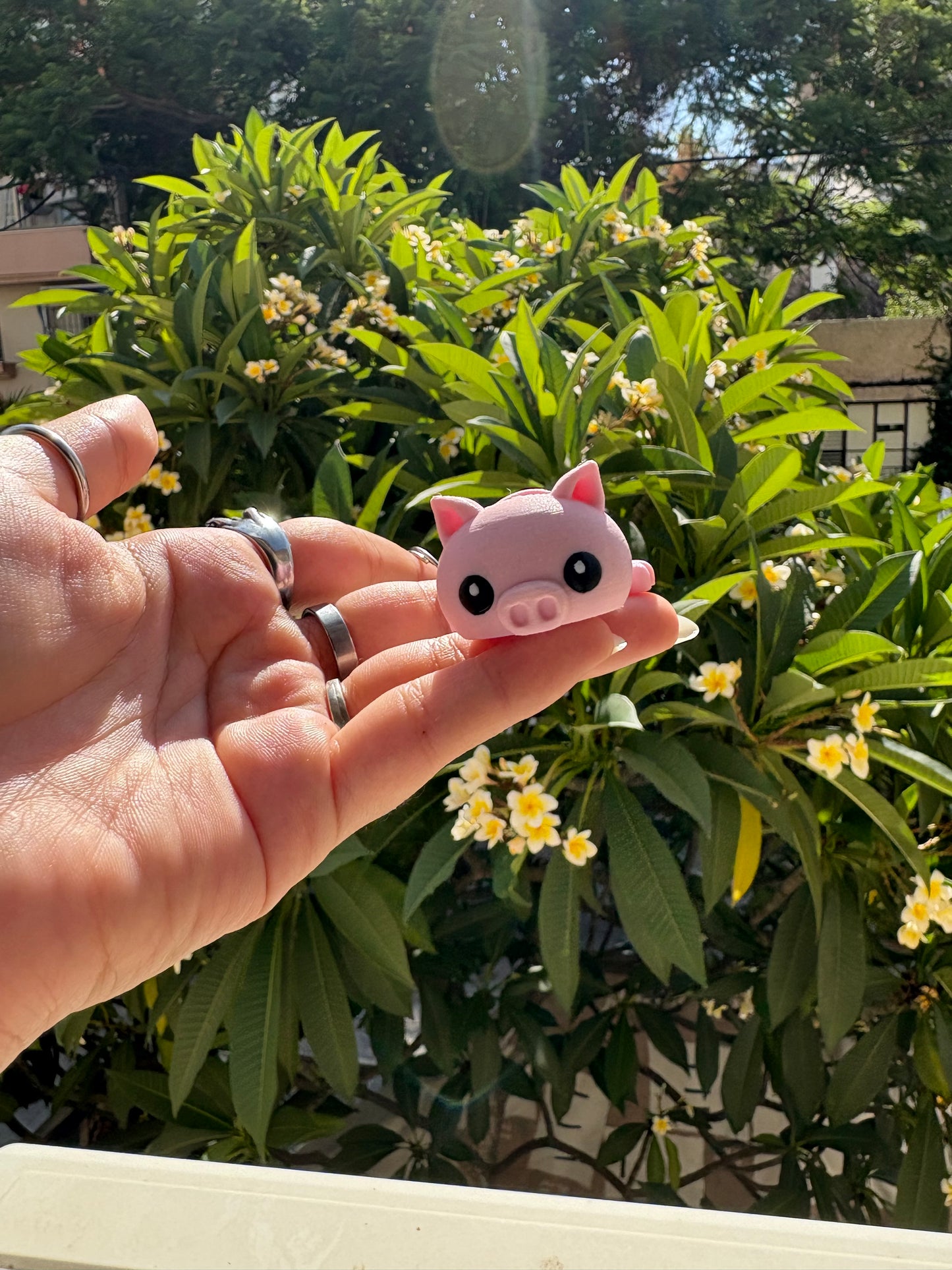Articulated pig keychain