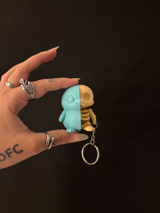Half penguin skull keychain