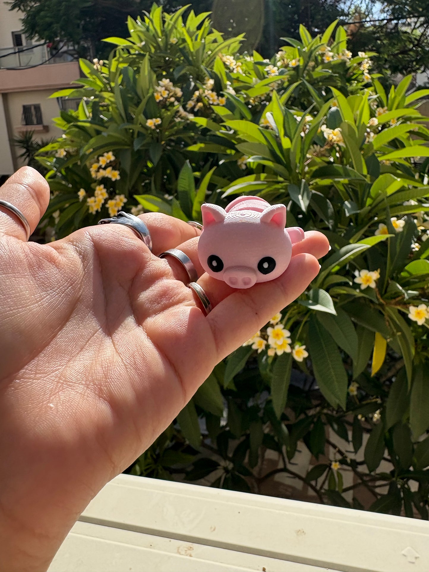 Articulated pig keychain