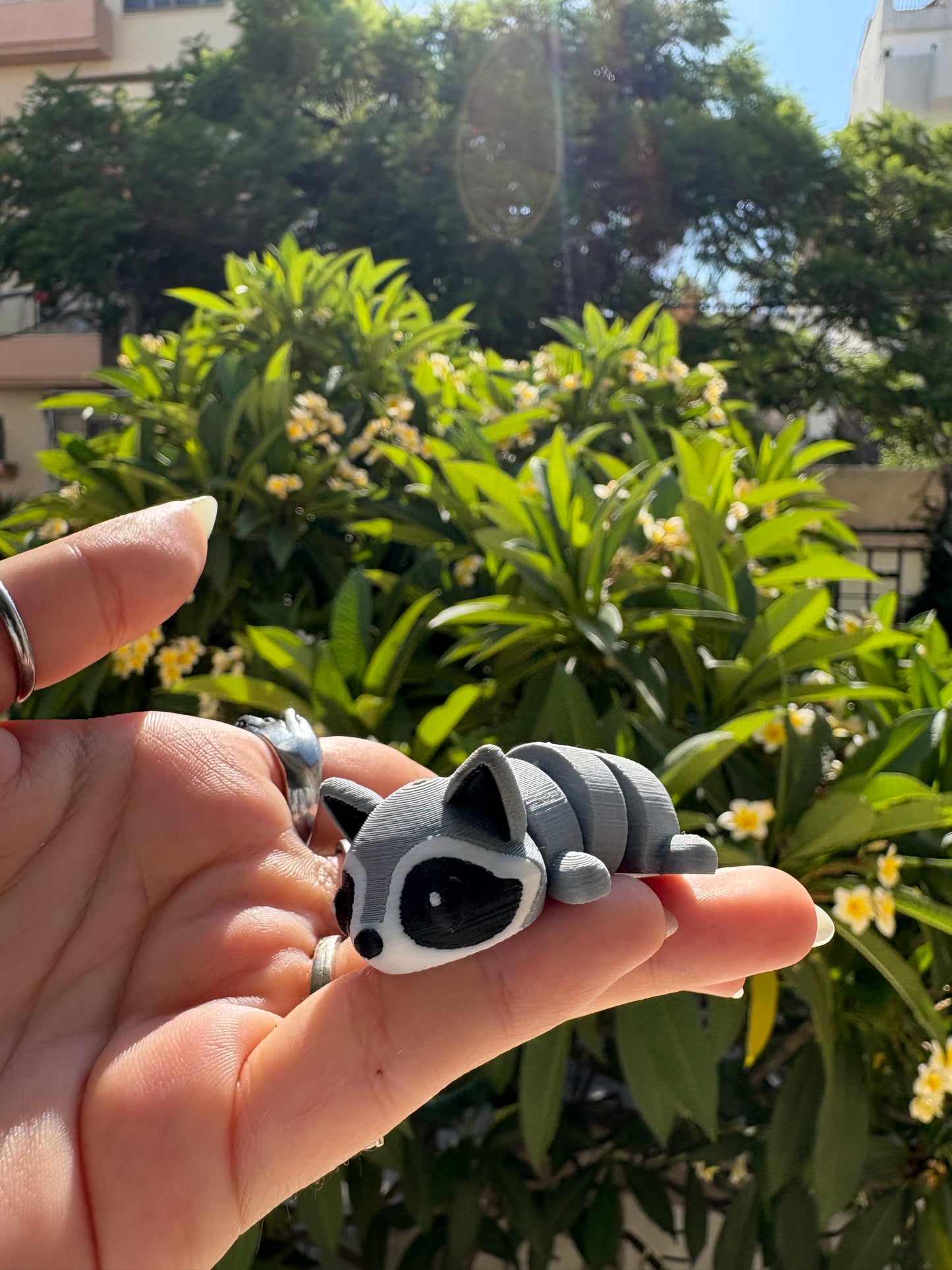 Articulated raccoon keychain