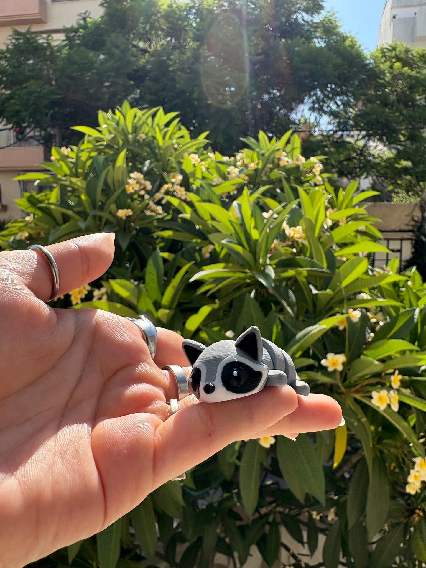 Articulated raccoon keychain