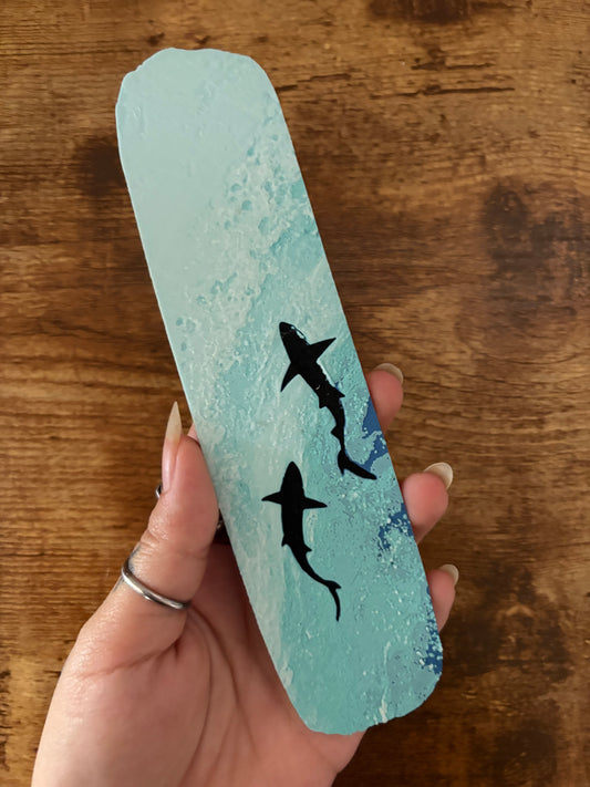 Swimming whales bookmark