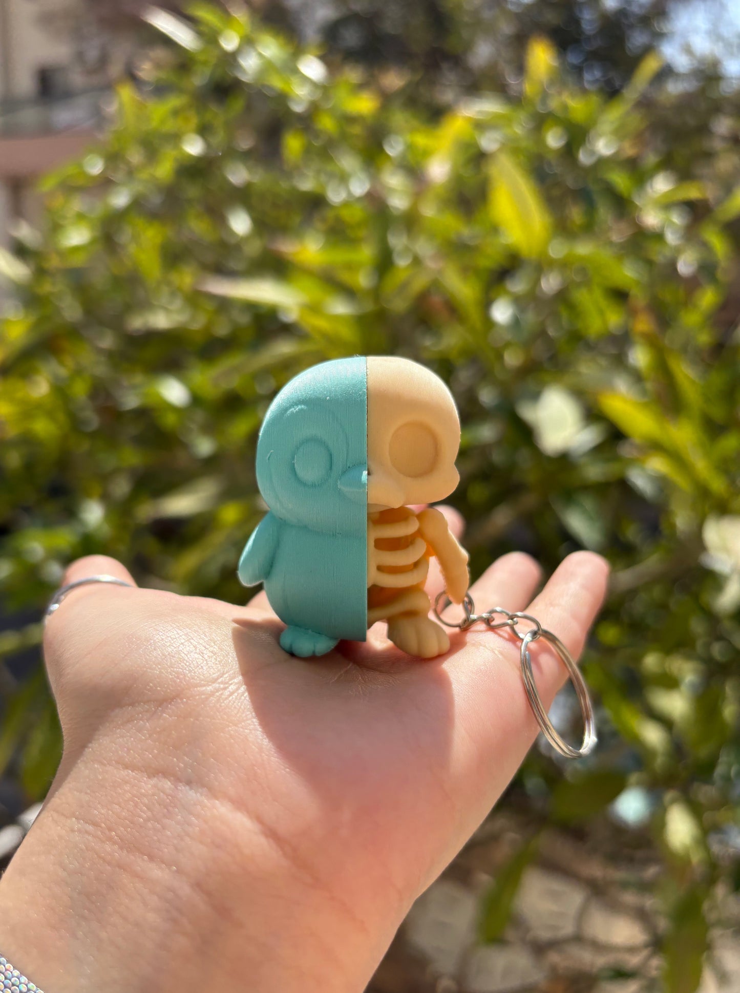 Half Penguin Skull Keychain